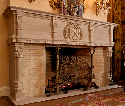 Custom hand-carved French limestone mantel and surround